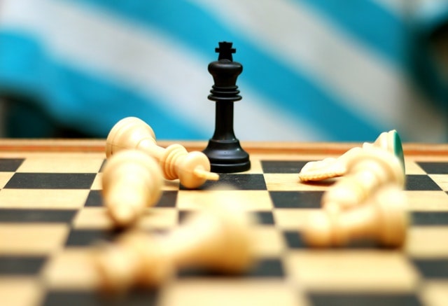 Chess play with a king winning