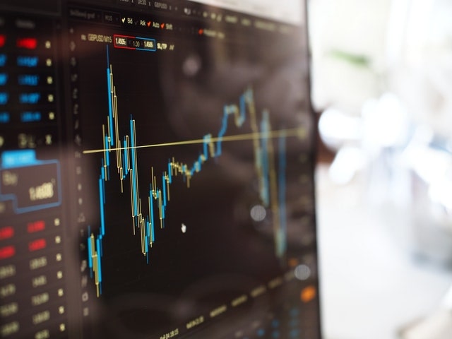 Financial chart on a black screen
