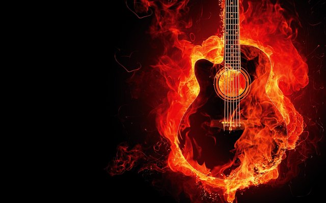 Burning guitar on a black font