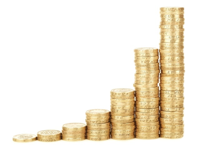 A row of golden coin in an ascending line