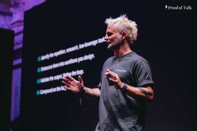 Marcus Graichen, founder and CEO of Taostats, speaking on stage at the Proof of Talk 2026 summit in Paris.